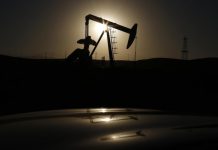 Oil prices go up slightly on Friday after extension in output cut