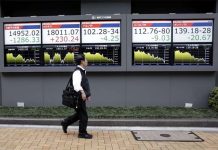 Asians stock markets slip after record highs on Wall Street