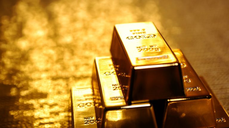 Gold prices rise, set for second straight weekly gain