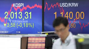 Asian stock markets mixed, as investors consider latest earnings