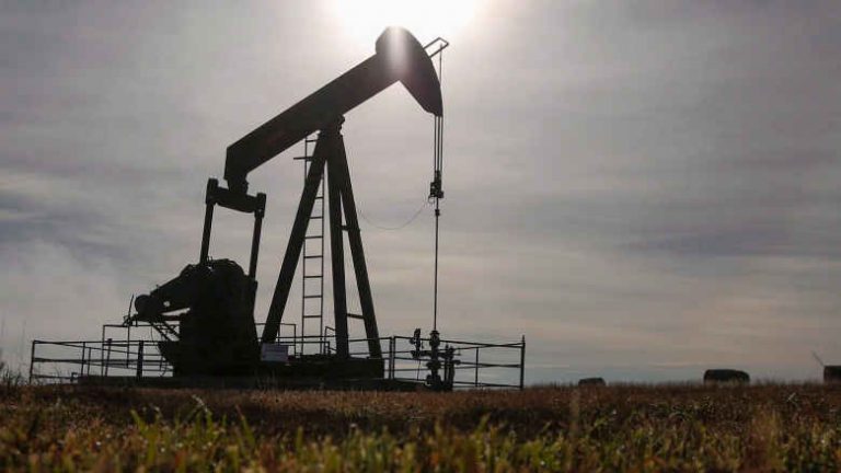 U.S. oil edges up after 3 percent drop on big stock build