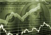 Rupee drops to record low of 125 against dollar