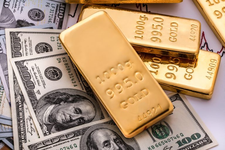 Gold at one-week low as dollar rallies and trade tensions ease