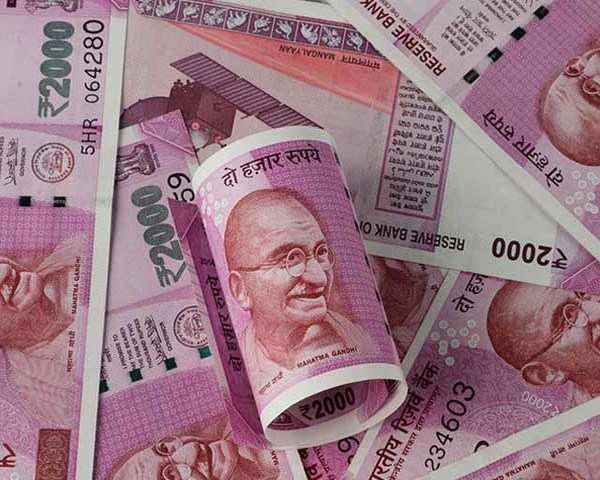 Indian rupee hits lifetime low, stocks tumble on global markets sell-off