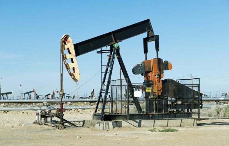 Oil prices pressured by oversupply, global economic concerns