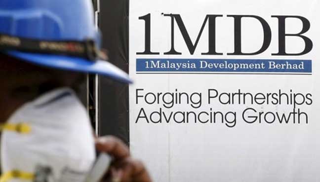 Malaysia files criminal charges against Goldman, ex-bankers in 1MDB probe