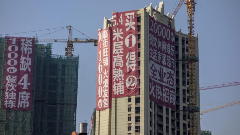 China warns cities to cut reliance on property, developers’ shares fall