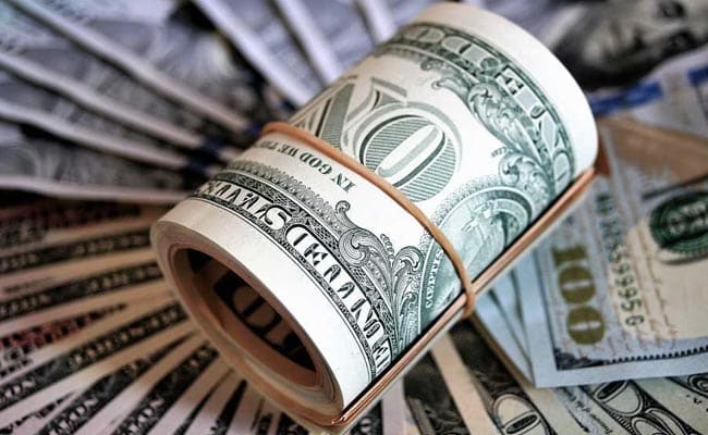 Dollar eases as focus shifts to Fed meeting; yen and Aussie dollar gain