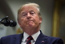 Trump warns China not to retaliate against US trade tariffs