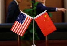 After Huawei blow, China says US must show sincerity for talks