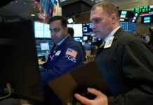 World stocks scale records on easing of Mideast tensions