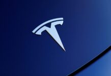 Another day, another record: Tesla shares hit $900