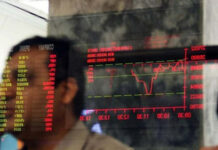 Stocks end flat after volatile session