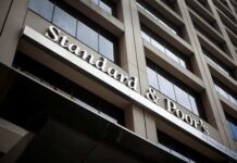 S&P slashes emerging market forecasts, warns of permanent scars