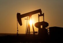 Oil mixed on tighter supply, surge in US virus cases