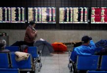 Tech lifts stocks as poor data rekindles stimulus hopes
