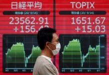 Asian shares buoyed by China optimism, markets eye US presidential debate