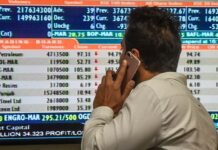 Stocks post modest gains despite selling pressure