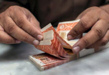Rupee weakens against dollar in interbank market