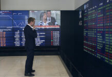 Global stocks tumble as lockdown fears grip investors