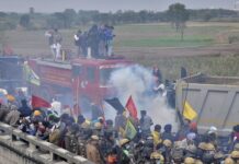 Police break up farmers’ march on Delhi over market reforms