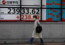 Global stocks head for record high on recovery, vaccine hopes