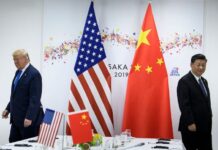 Trump signs bill that could kick Chinese firms off US stock exchanges