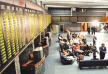 Stocks close flat on lack of triggers