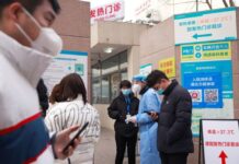 China steps up Covid-19 restrictions near Beijing as local infections rise